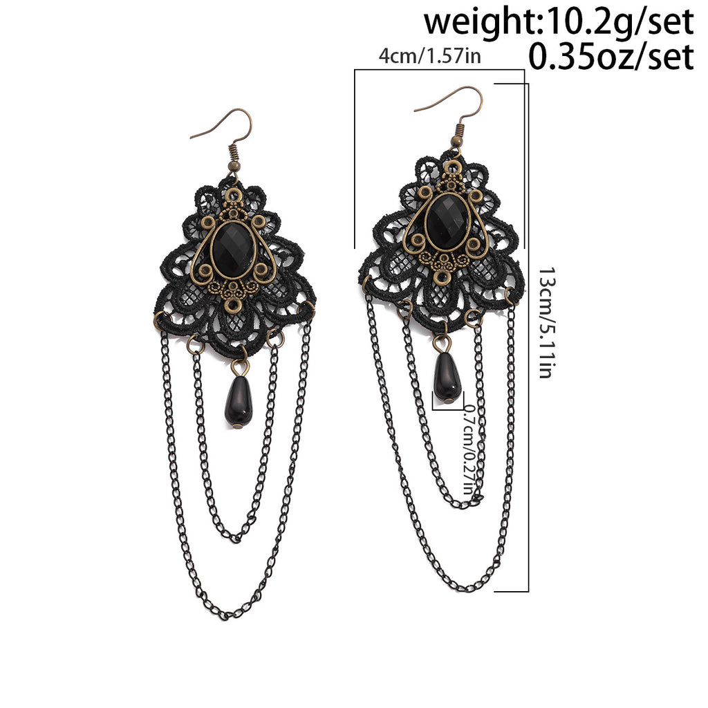 A Vintage rustic style pair of earrings on hooks with a chandelier style.