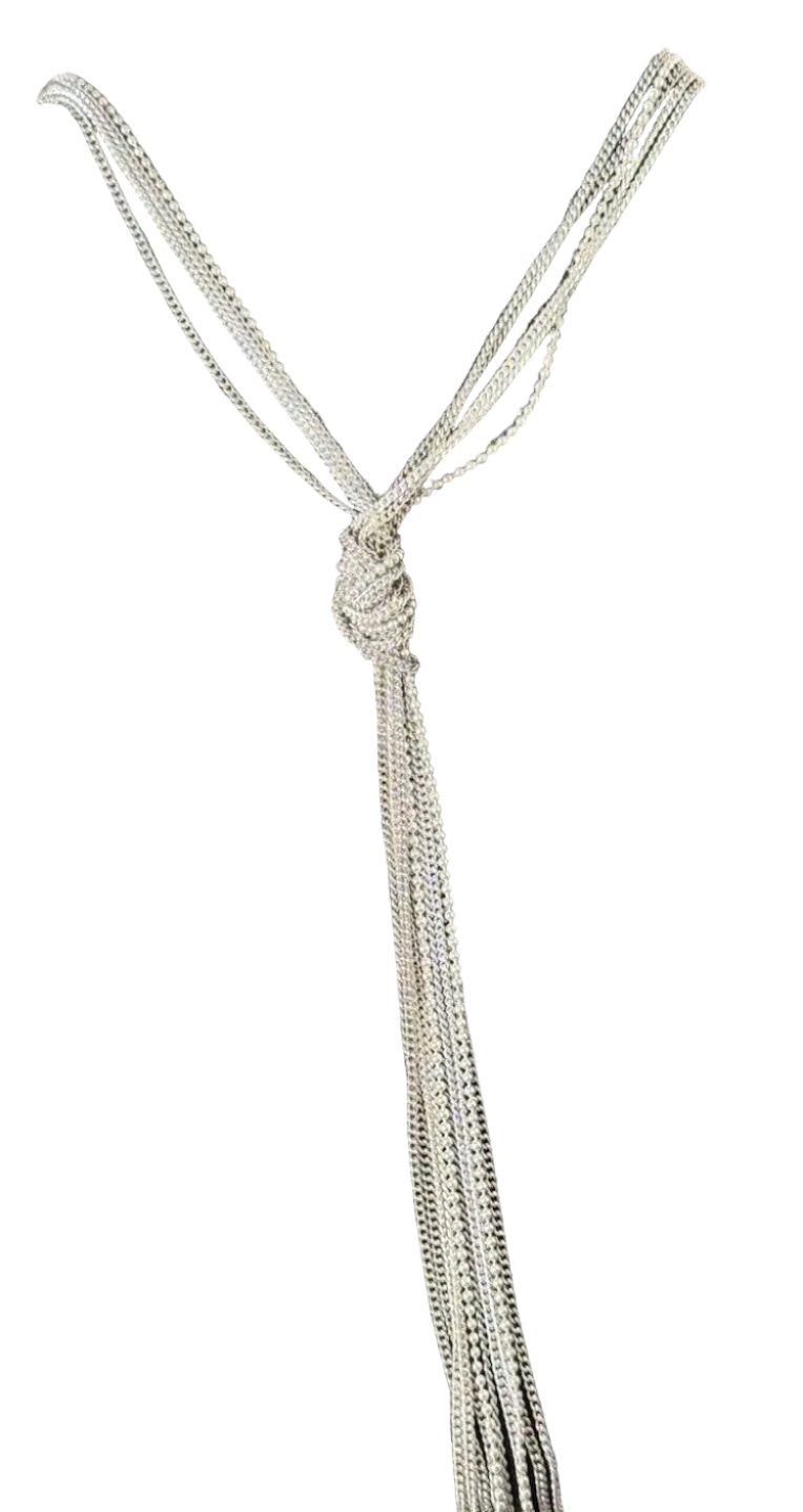 A silver-toned multi-strand snake chain necklace with a knotted tassel design, shown against a clear background.
