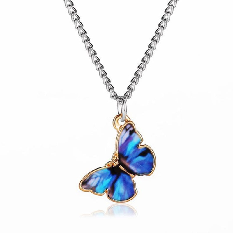 This is a close up of the darker butterfly on the silver chain. The butterfly has a gold tone surround. English Rose
