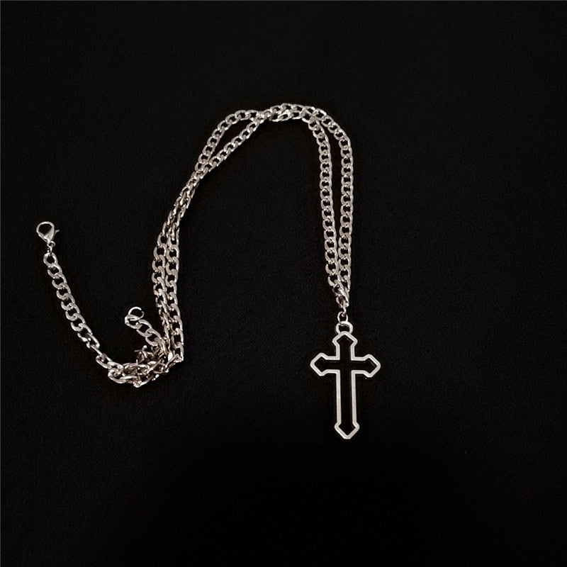 Another angle of the chain and cross, on a black background