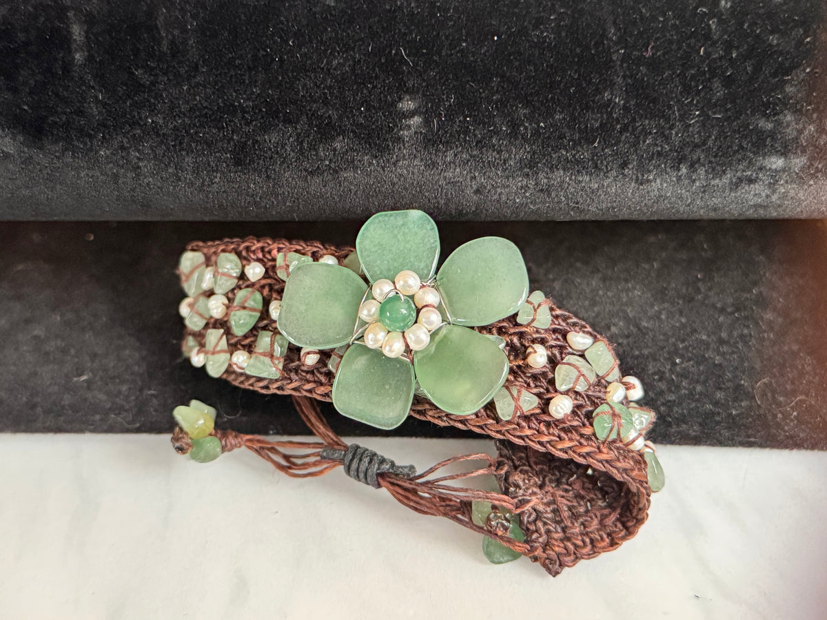 Vintage green jade and seed pearl wide woven bracelet with carved jade flower centrepiece