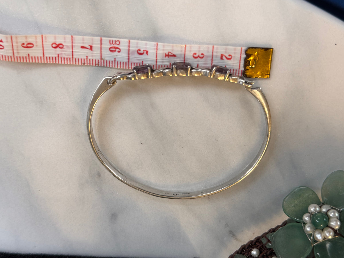 this is an image of the Sterling bracelet with a tape measure showing its 7 cm wide (Wrist shaped)