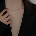 Vintage Love Necklace with interlocking style. Small & Beautiful for women in gold-tone or silver-tone
