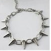 A silver-toned spiked chain bracelet with sharp triangular spikes, shown against a plain white background.