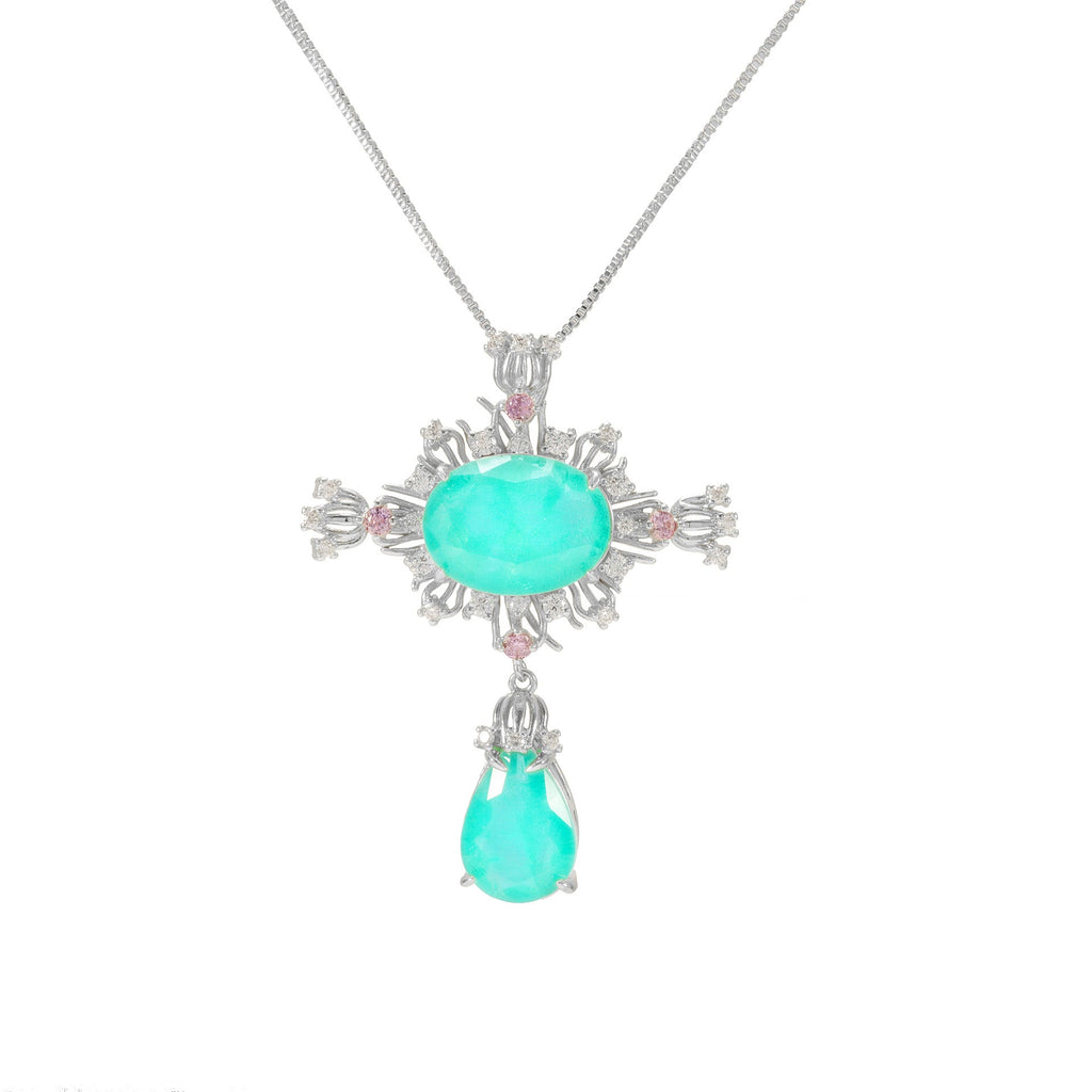 The platinum -tone Palace style cross necklace on a white background. English Rose