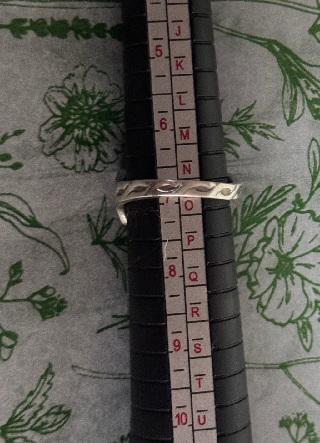 A lovely shot of the ring size on a ring gauge mandrel