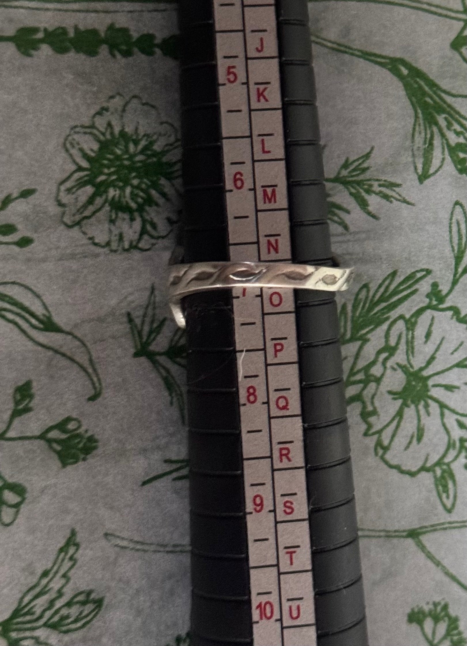 A lovely shot of the ring size on a ring gauge mandrel