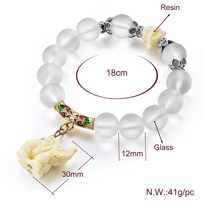 The bracelet has glass opal look beads and resin charms x 2 he beads are 12mm and the dangle elephant is 30 mm