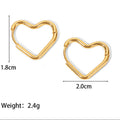 A Vintage style gold tone pair of heart shaped hoops on a white background display with at 2cm and a height of 1.8cm. weight 2.4grams