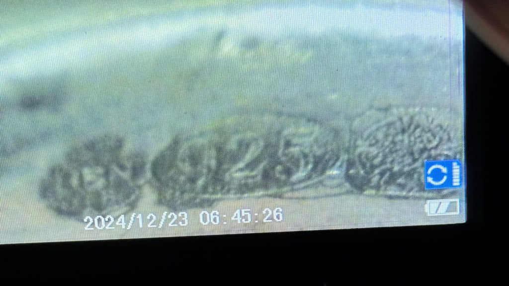A highly magnified shot of the briish Hallmark displaying maker and 925 for hallmarked silver in Great Britain.