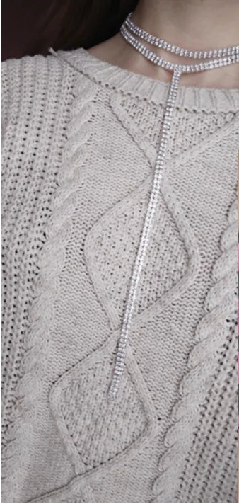 The silver-tone style Over a jumper