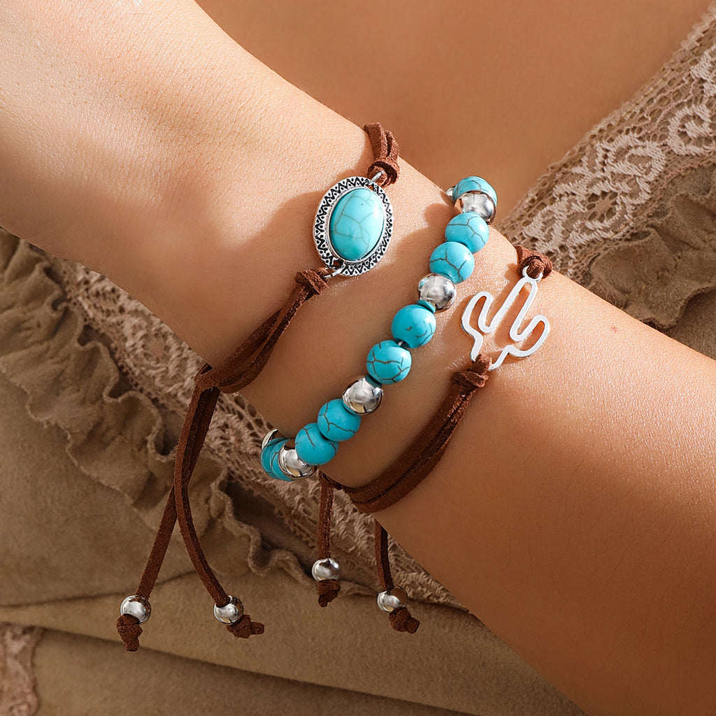 This is the matching pendant with cord, Beads And a cactus. Gorgeous turquoise coloured cabochon and Howgate style beads. 